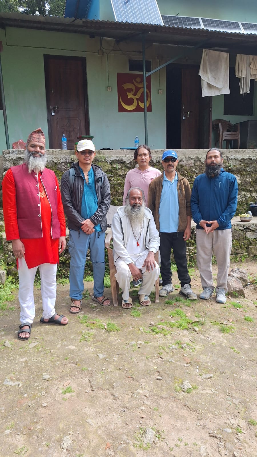 Practitioners gathered outside a retreat house in the hills of Nepal