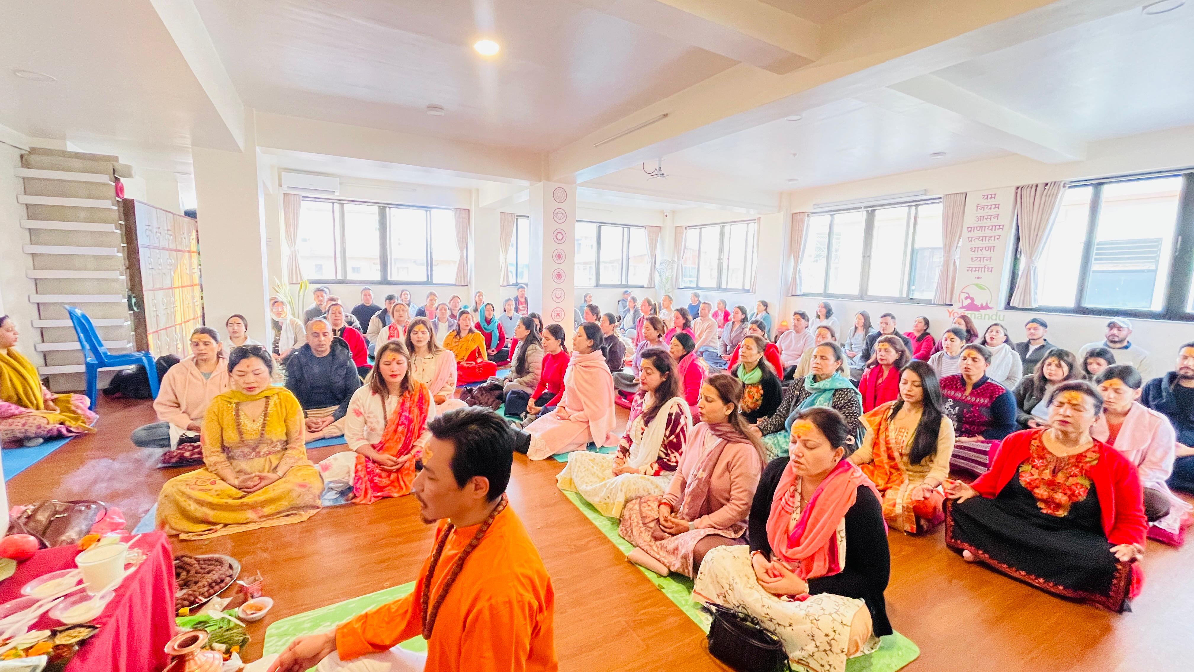 Large satsang gathering during a yoga ceremony in Nepal
