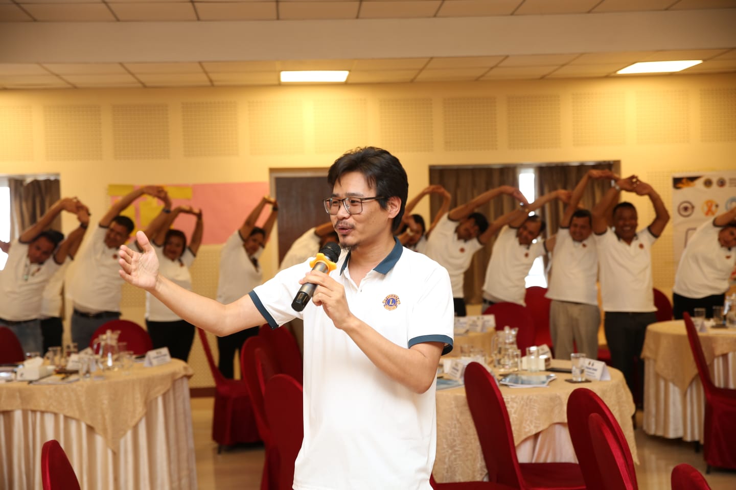 Arjuna speaking at a yoga community event in Kathmandu, Nepal