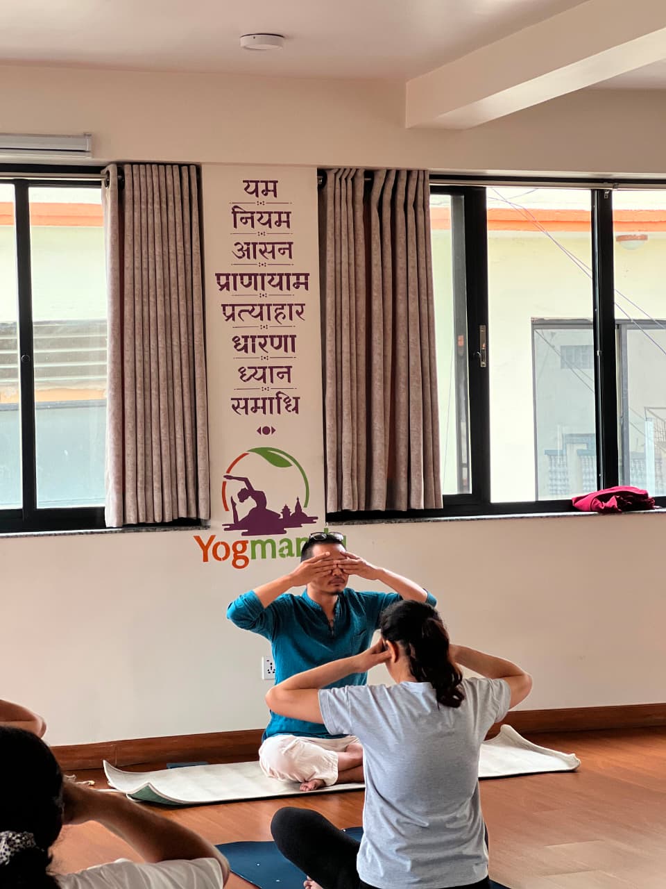 Student practising seated pranayama breathwork at Yogmandu studio in Kathmandu